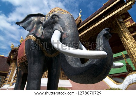 Close up picture of the black Elephant Statue in the Wat Saen Muang Ma Luang in Chiang Mai, Thailand