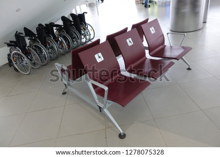 wheelchair in the airport building. Caring for people with disabilities