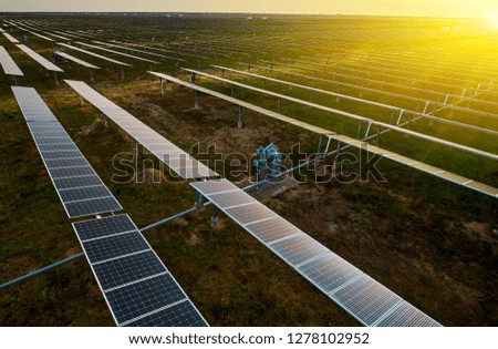 New energy solar photovoltaic panels under the setting sun