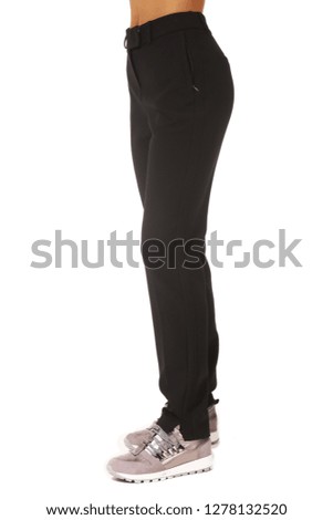 black official trousers on model legs with sneakers shoes