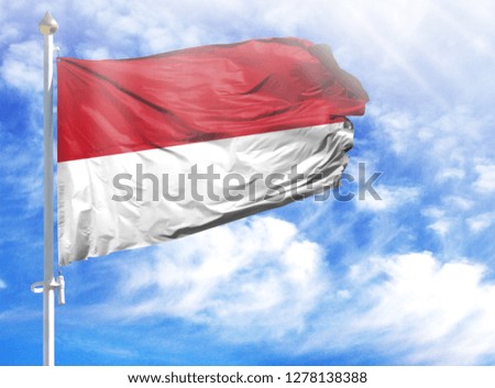 National flag of Indonesia on a flagpole