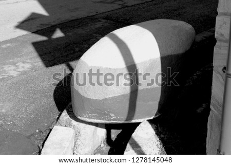 Traffic Sign Shadow on Round Rock