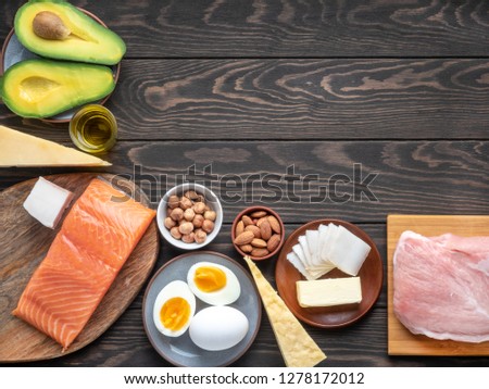Selection of Ketogenic diet products on wooden background with copyspace in right top corner. Royalty-Free Stock Photo #1278172012