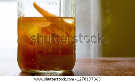 Alcohol infusion with orange peels