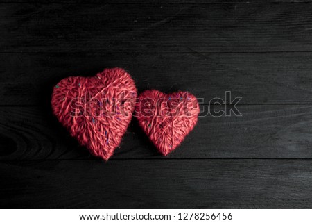 Greeting card with a red hearts and space for text on a wooden background. Love concept.Valentines day.