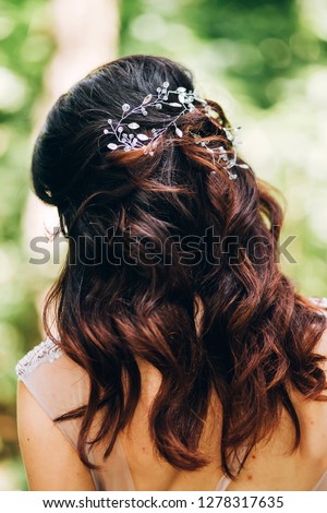 romantic wedding hairstyle. hair ornament