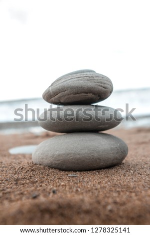 Balance stones on the Beach in close up