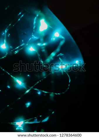 Magic blue decorative led lamp on a black background