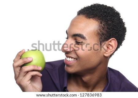 Beautiful teenager with an apple