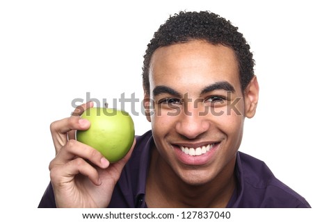 Beautiful teenager with an apple