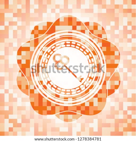 key icon inside abstract orange mosaic emblem