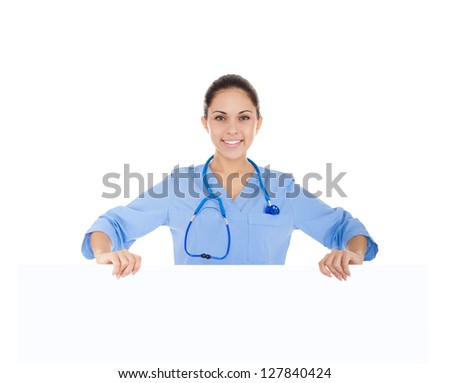 nurse doctor woman smile hold blank card board, concept of advertisement product, empty copy space, wear blue surgery medical suit with stethoscope. Isolated over white background