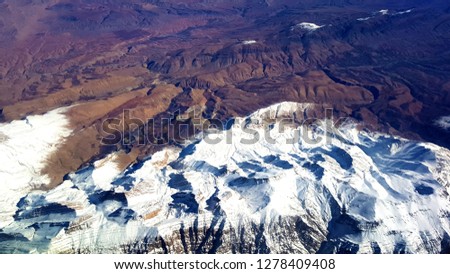 Iran landscape from above airplane photo mountains tops with snow