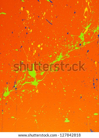 Vector shot of color splashes on orange background