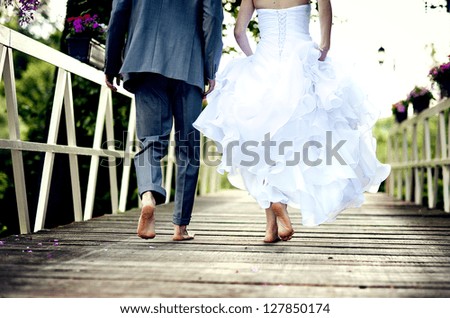 Beautiful wedding couple is enjoying wedding Royalty-Free Stock Photo #127850174