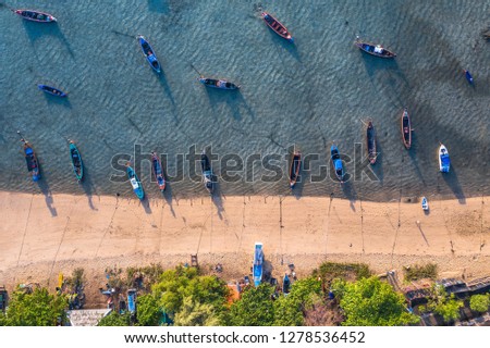 top view fishing boats in the shore during low tide at Rawai beach Phuket Thailand