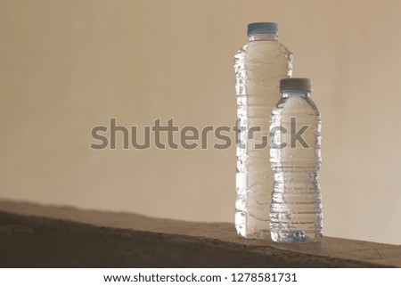 Two different size of water plastic bottle.