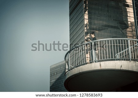 Woman photographer taking photo in urban city