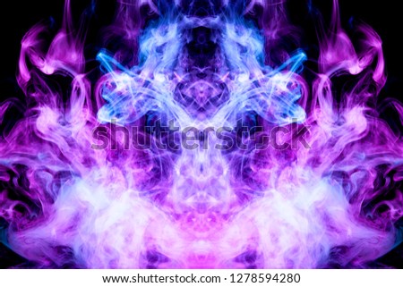 Thick colorful blue and purple smoke  in the form of a butterfly on a black isolated background. Background from the smoke of vape. Mocap for cool t-shirts
