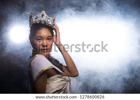 Concept every Girl Dream to Miss beauty Universe contest. Rural unique Bone Jawline Woman warships wear Diamond Silver Crown as Final want in Life, studio lighting with back light flare silhouette