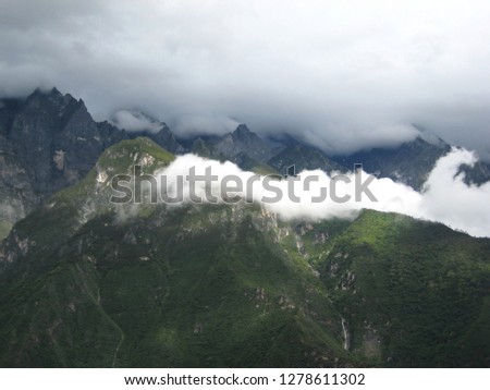 Tiger Leaping gorge, Jade Dragon Mountain or Yulong Mountain and Haba Mountain at Shangri-la, Yunnan China