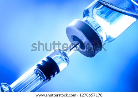 Closeup of syringe and injection vial flu, measles, coronavirus, covid-19 vaccine disease prepare for human, child, adult, pregnant woman clinical trials vaccination shot, medicine and drug concept.