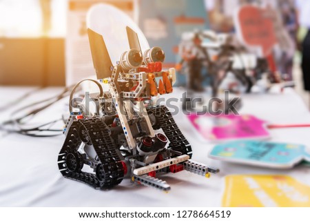Stem educations,inventor school Creating robotics project,School boys planning of innovation robot model in laptop,microcontroller Circuit board Analysis assembly,DIY robot in science education class Royalty-Free Stock Photo #1278664519