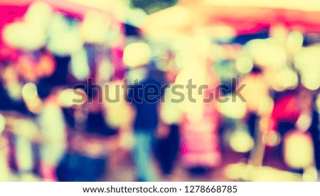 Vintage tone abstract blur image of Day market  on street with bokeh for background usage .