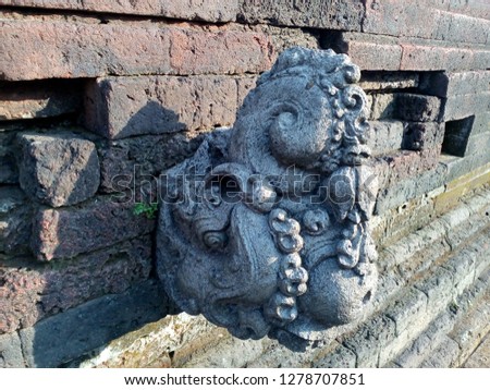 This is called Jaladwara, a kind of water fountain from ancient Java. In the picture are 15th century style of Jaladwara from Majapahit era. These Jaladwara are located at Tikus Temple, Trowulan.