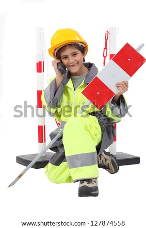 boy dressed as a road worker