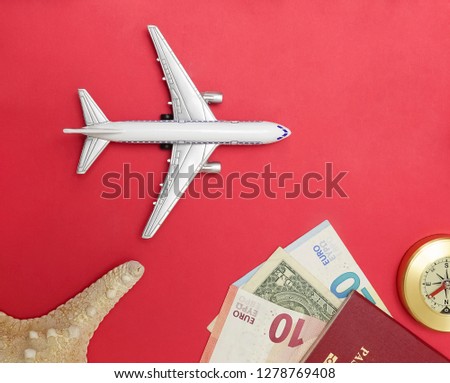 set of objects for travel isolated on red paper background. 