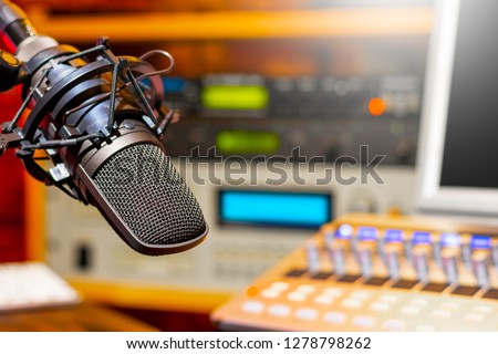 microphone in radio broadcasting, podcast, voice acting studio
