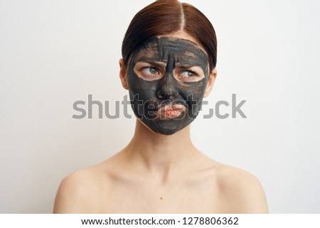 woman in cosmetic mask care