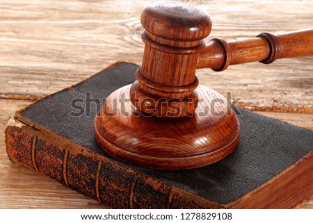 Law gavel or judge mallet on a wooden desk