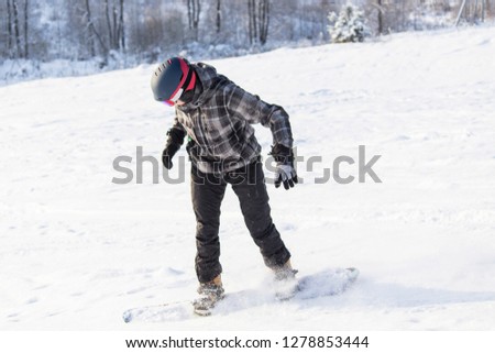 Men on the snowboard. Winter sport. 