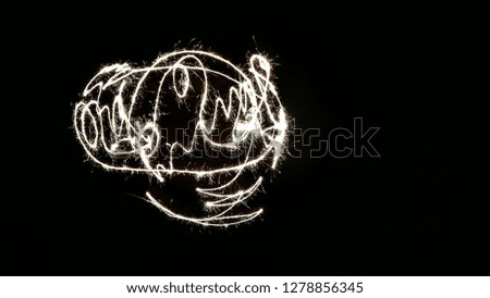 beautiful abstract pictures of Bengal Christmas lights isolated on black background copy space. Festive pattern ornament drawings for postcard. Ideas for wallpaper design