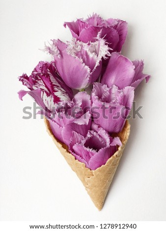 concept spring waffle cone with purple tulips