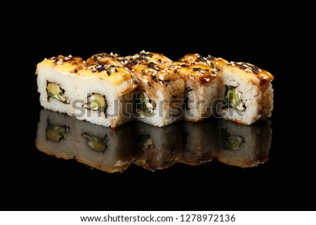 various sushi, rolls on a black background with reflection. especially for cafes and restaurants