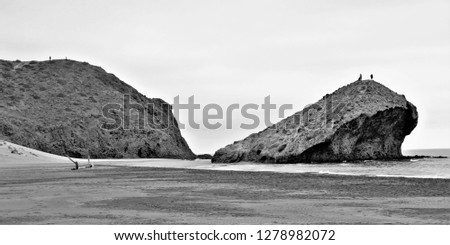 Tribute to Ansel Adams, black and white artistic photographs,The petrified wave, beach of Mónsul, Natural Park, Cabo de Gata, spain, indiana Jones movie stage and the last crusade, tongues of lava, Royalty-Free Stock Photo #1278982072