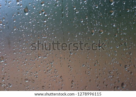 Drops of water on clear glass