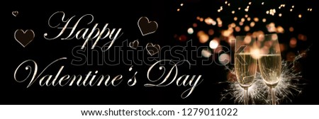 Image of two champagne glasses and text Happy Valentine's Day