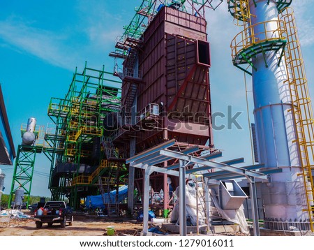 An electrostatic precipitator (ESP) is a filtration device that removes fine particles. During construction. Royalty-Free Stock Photo #1279016011