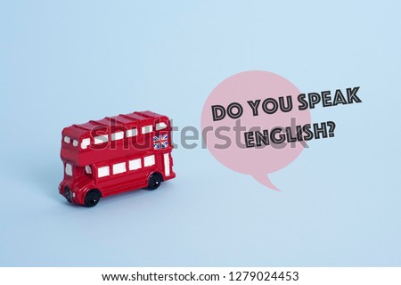 a red double-decker bus, typical of London, United Kingdom, and the question do you speak English? on a blue background