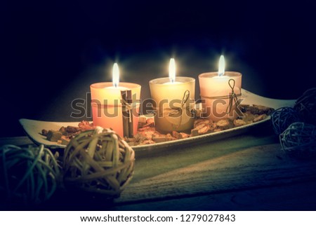 still life with three little candles