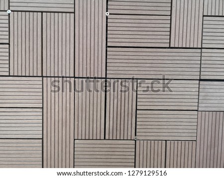 Patterned surface of a piece of wood