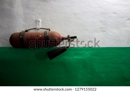 Fire extinguisher hanging on the wall