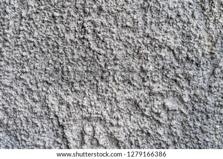 Aged dark gray plaster with patterns and cracks - high quality texture / background