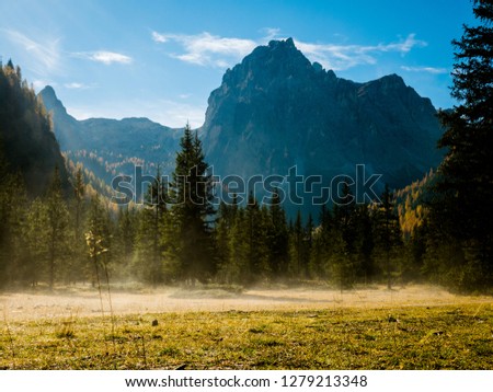 Autumn sunrise in Dolomites mountains South Tyrol
