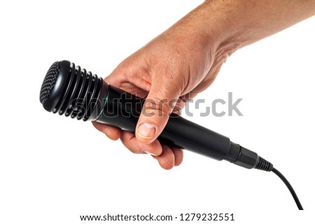 Hand holding a microphone interview conducting a business isolated on white background.