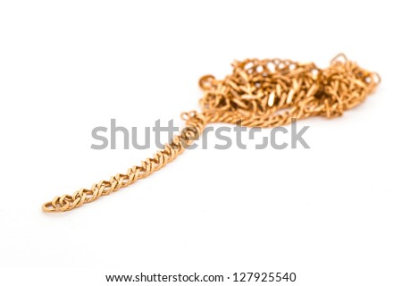 A gold chain isolated on a white background.